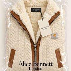 Claudio | Fleece-Lined Cable-Knit Zip Jacket – compactly folded Alice Bennett London packaging