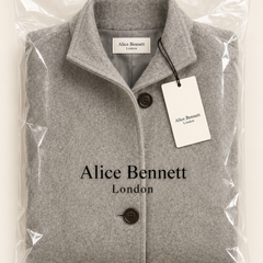 Valentina | High-Collar Button-Front Coat – compactly folded Alice Bennett London packaging