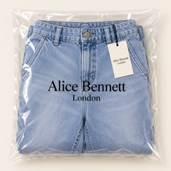 Lumière | High-Waisted Cropped Barrel Jeans – compactly folded Alice Bennett London packaging