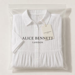 Alice cotton button shirt dress in an Alice Bennett London polyzip bag