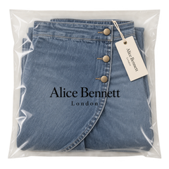 Ashley wrap-panel jeans in Alice Bennett London packaging