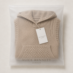 Beige hooded knit waistcoat in Alice Bennett London packaging