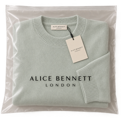 Pale mint classic crew-neck sweater in Alice Bennett London packaging