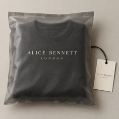 Alice Bennett London packaging with folded Corvyn sweater and hangtag