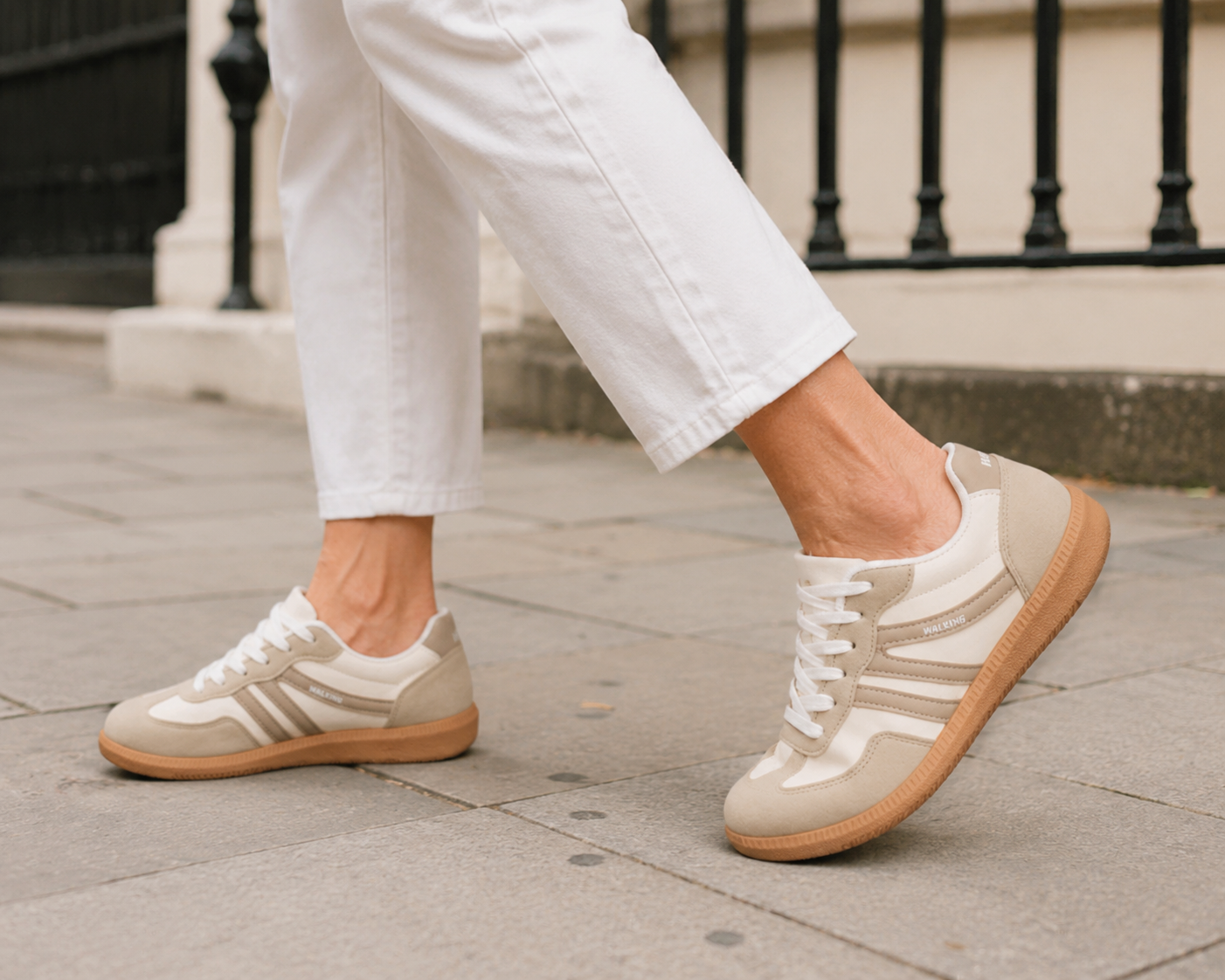 Woman wearing Deliza orthopaedic trainers in off-white and beige