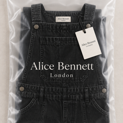 Elizabeth black denim dungarees in Alice Bennett London branded packaging