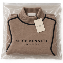 Emilie brown piped turtleneck jumper in Alice Bennett London packaging