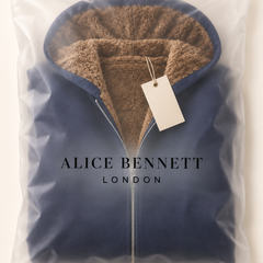 Evelyn sherpa-lined hooded coat in Alice Bennett London packaging with hangtag