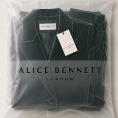 Alice Bennett London branded packaging for emerald velvet suit
