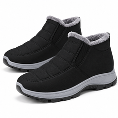 Sianna quilted faux-fur-lined slip-on ankle boots in black on a white background