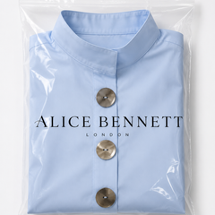Queniva structured blouse folded in Alice Bennett London polybag