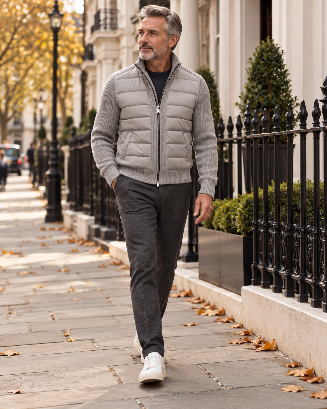 A man wearing the Kylian grey quilted knit jacket while walking in London