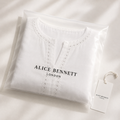 Folded Harlow premium linen midi dress in Alice Bennett London packaging