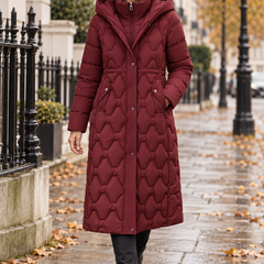 Helen longline hooded down coat worn by a woman in London