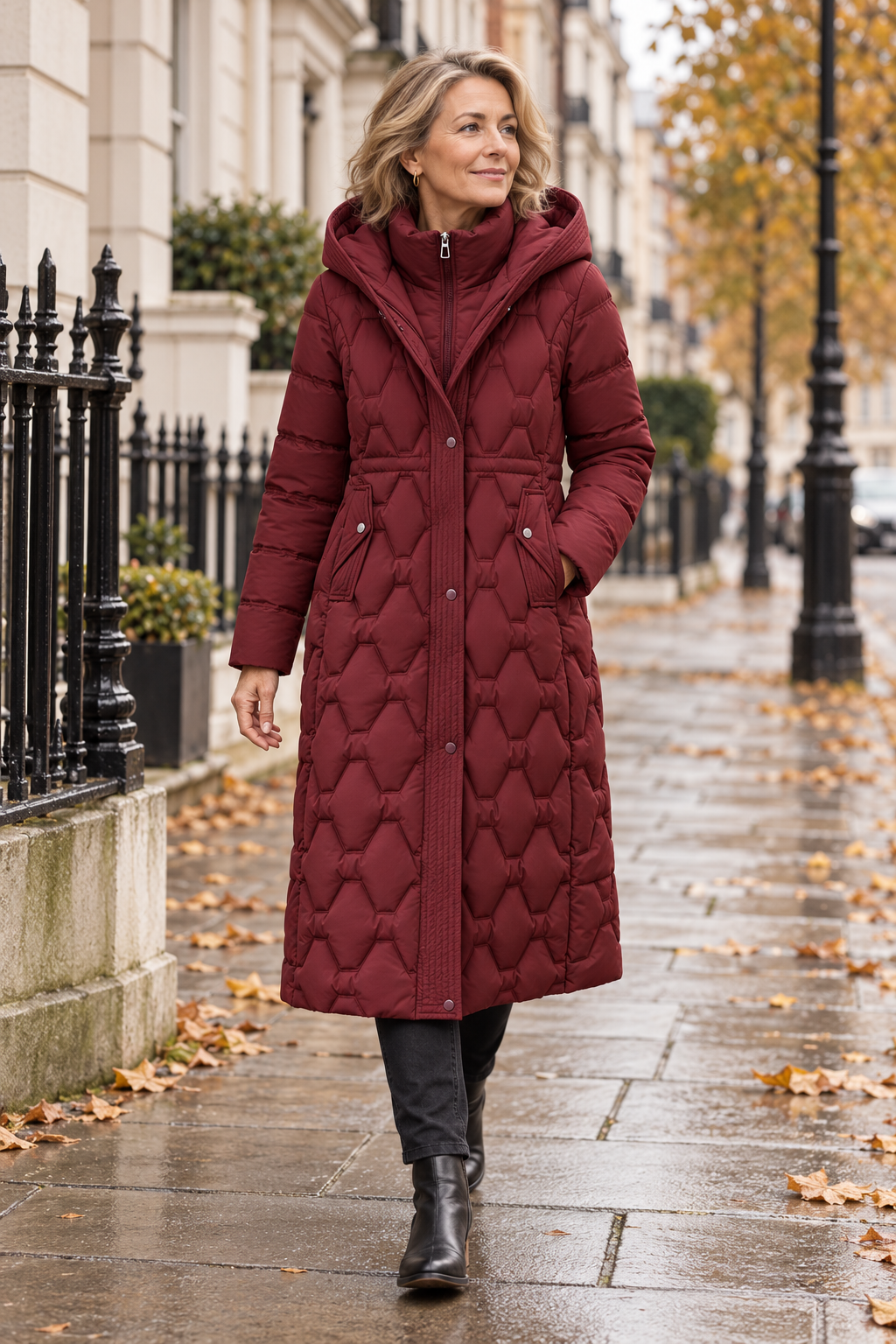 Helen longline hooded down coat worn by a woman in London