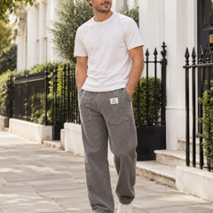 Jeroen ribbed relaxed-fit trousers worn by a male model in London
