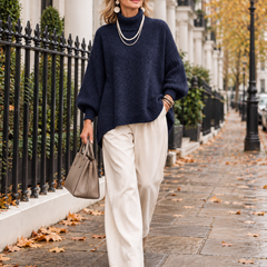 Kathleen Navy turtleneck sweater walking in London