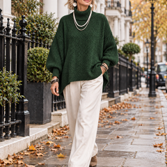 Kathleen Dark Green turtleneck sweater walking in London
