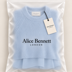 Blue Kestlyn layered-look sweater inside an Alice Bennett London polybag