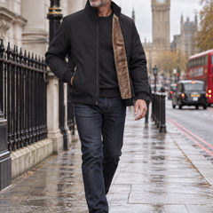 Man aged 50 to 55 wearing the Lars thermal waterproof jacket while walking in London