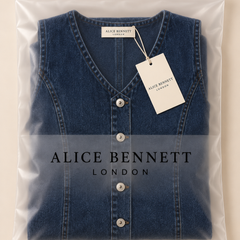 Lila denim mini dress in Alice Bennett London packaging