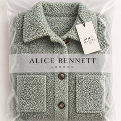 Alice Bennett London sage-green teddy sherpa jacket in branded packaging