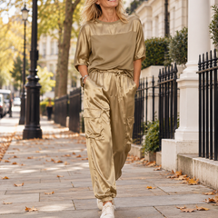 Woman wearing the Nova Gold two-piece cargo set in London