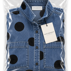 Blue polka-dot denim top in Alice Bennett London packaging