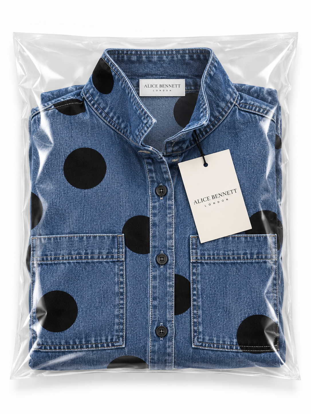 Blue polka-dot denim top in Alice Bennett London packaging