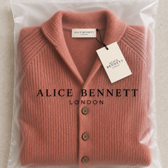 Silvoro ribbed cardigan folded in an Alice Bennett London branded polybag with attached hangtag