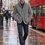 Silvoro Dark Blue cardigan worn by a male model walking in London