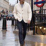 Silvoro White cardigan worn by a male model walking in London