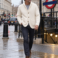 Silvoro White cardigan worn by a male model walking in London