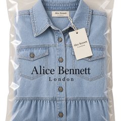 Sophia light blue denim midi shirt dress folded in Alice Bennett London branded packaging