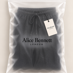 Sven lightweight linen trousers in Alice Bennett London packaging