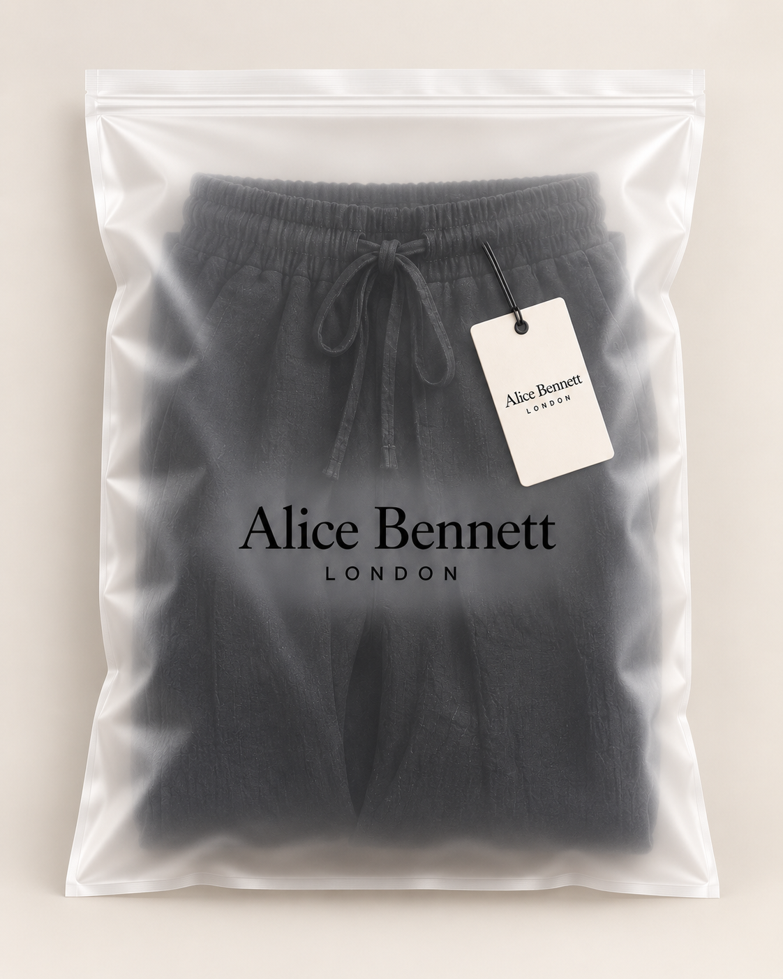 Sven lightweight linen trousers in Alice Bennett London packaging