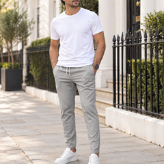 Victor tapered trousers worn by a male model in London
