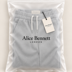 Victor tapered trousers in Alice Bennett London packaging