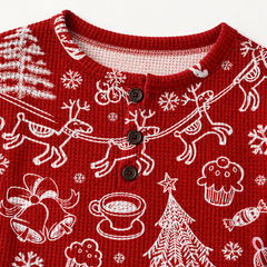 Close-up of the red Christmas graphic pullover sweater knit and festive print