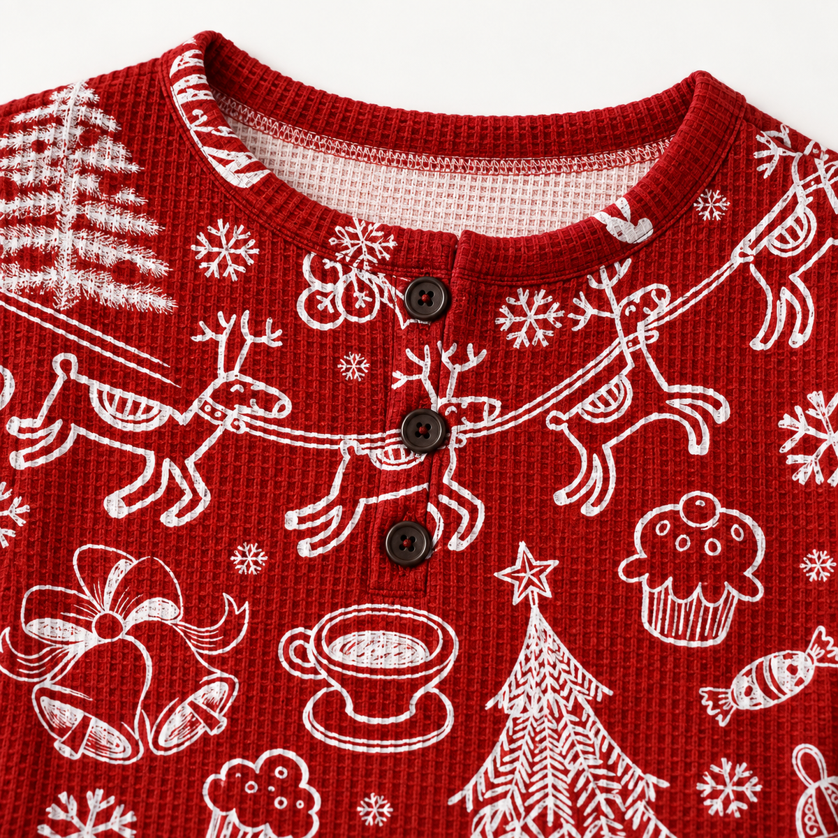 Close-up of the red Christmas graphic pullover sweater knit and festive print