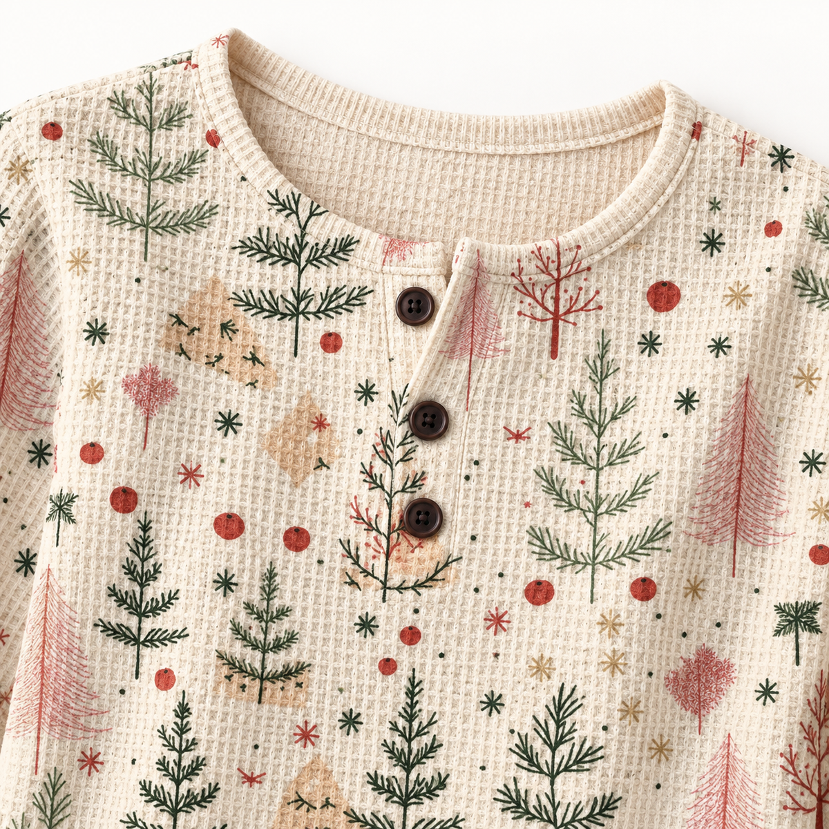 Close-up of the cream Christmas tree print waffle-knit pullover sweater
